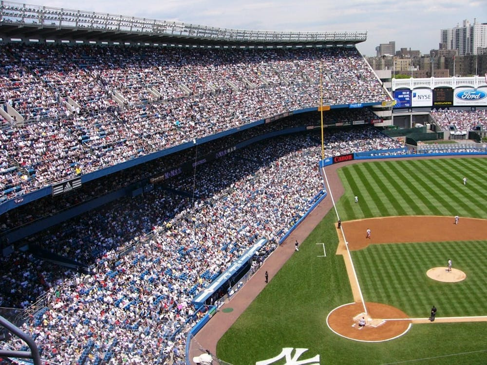 Crowd-filled baseball stadium during a live game