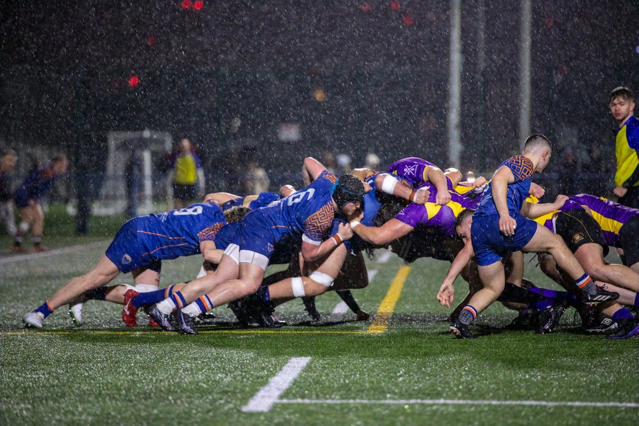 Match de rugby sous une pluie battante